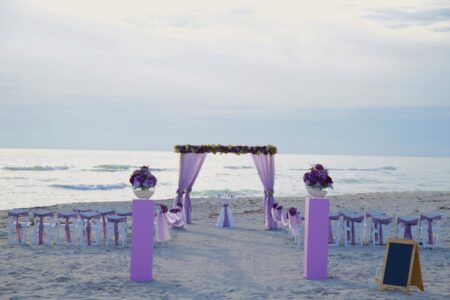 Elegant Purple Beach Wedding Ceremony Set in Sarasota, Florida | Affordable Beach Weddings