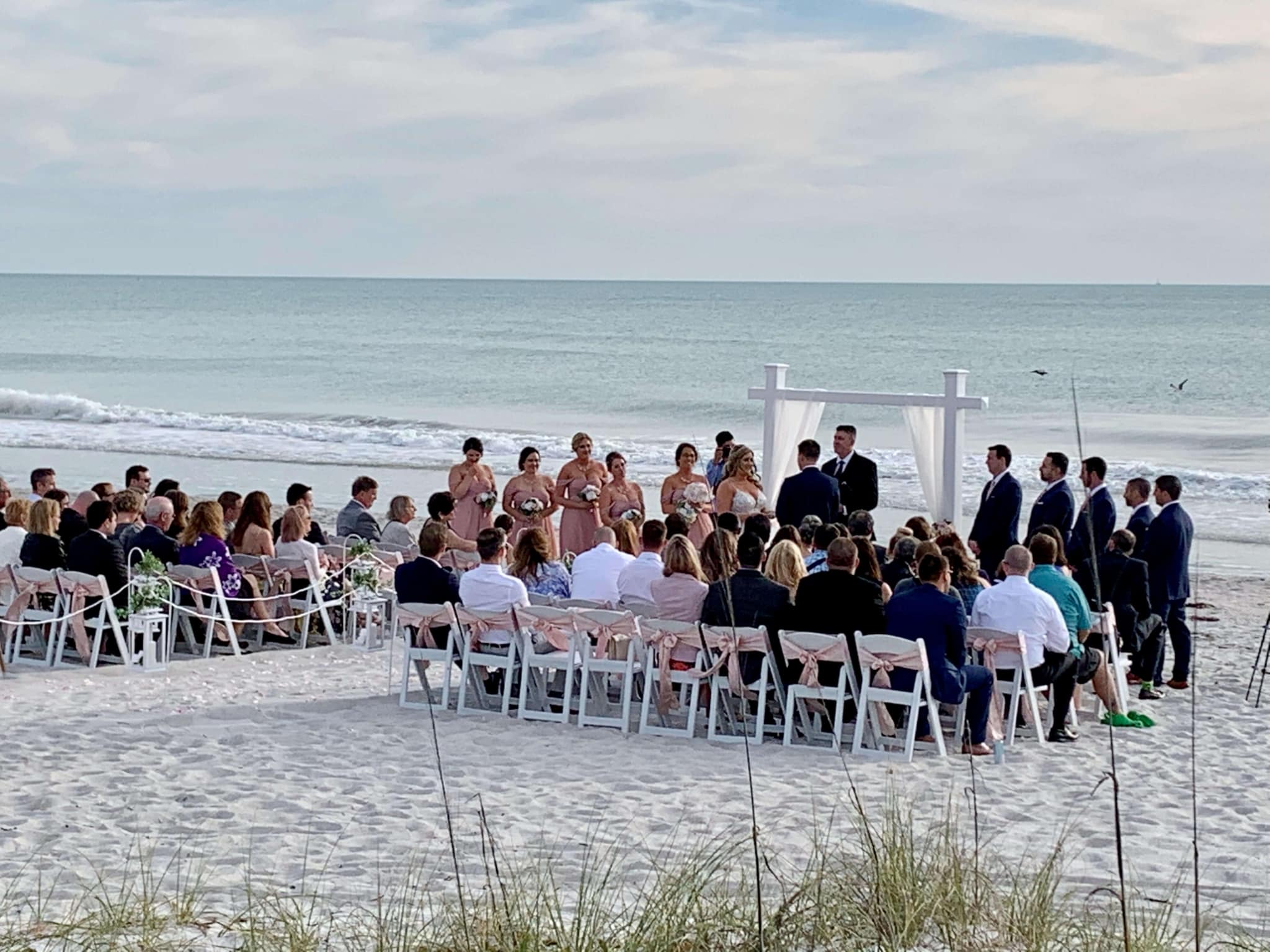 Florida Beach Wedding Ceremony with White Arbor