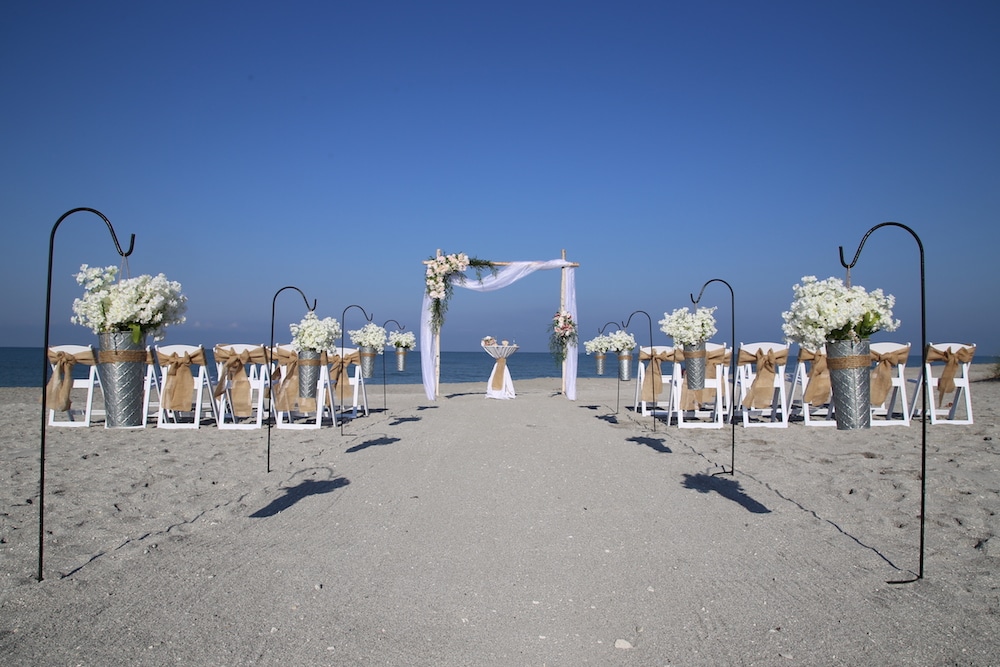 2023 Beach Wedding Trends and Inspiration | Natural Birch Arch with Asymmetrical Drape and Florals