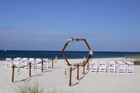 Affordable Boho Beach Wedding in Florida with Hexagon Frame Arch Backdrop