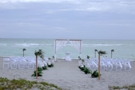 Topical White Sea Star Themed Beach Wedding Ceremony Setup for Florida Gulf Coast Beach Wedding