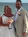 Kevin Julia Florida Beach Wedding Couple under Arbor