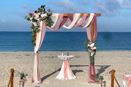 Romantic dusty rose beach wedding ceremony design, multi-color rose and burgundry wedding backdrop with wood frame for Florida beach wedding