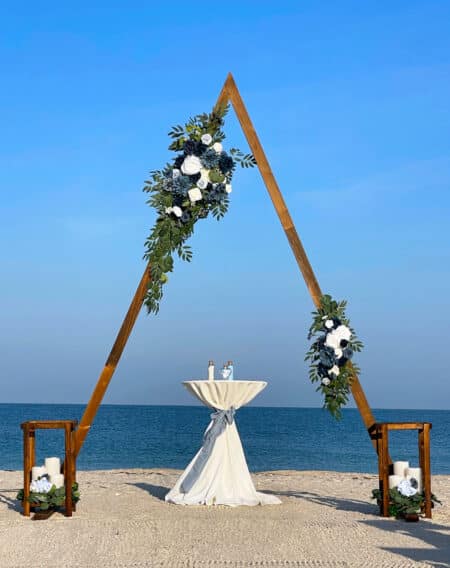 florida beach wedding wooden triangle arch 2