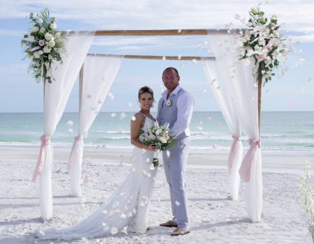 Elegant White Floral Beach Wedding Ceremony Arbor in Florida