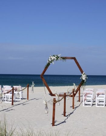Affordable Boho Beach Wedding in Florida with Hexagon Frame Arch Backdrop