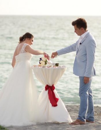 bride and groom married by the ocean | sand ceremony | florida sun weddings